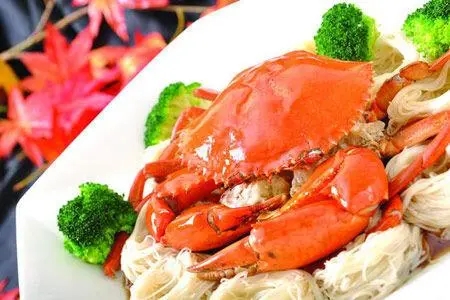 螃蟹和柿子一起吃会怎样 吃柿子多久不能吃螃蟹